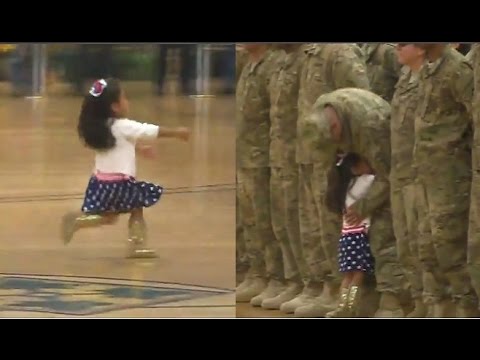 طفلة تخرق عرضا عسكريا.. لتعانق والدها !