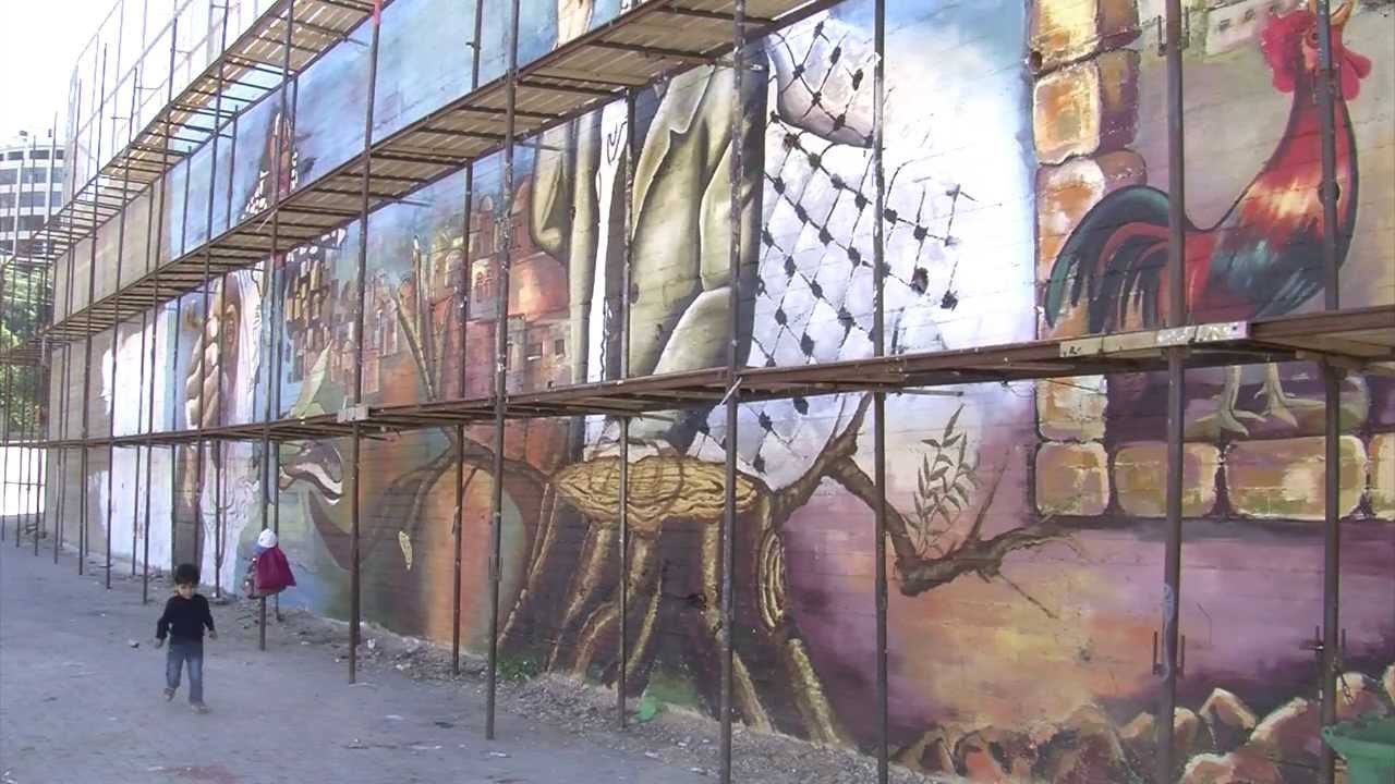جدارية ضخمة بنابلس تروي حكاية الفلسطينيين