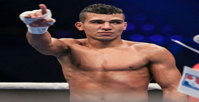 محمد ربيعي يتوج بطلا للعالم في الملاكمة بقطر