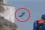 لقطة مذهلة.. يقفز من ارتفاع 530 قدما لإنقاذ صديقه