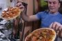 بالفيديو...هكذا يتم تناول البيتزا في الفضاء الخارجي