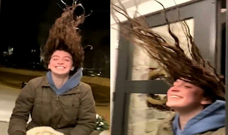 بالفيديو.. شعر فتاة يتحدى الجاذبية بسبب الطقس البارد في أمريكا