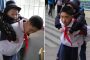 الصديق وقت الضيق... طفل يحمل صديقه المعاق إلى المدرسة كل يوم (فيديو)