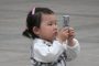 هاتف ذكي يسبب كارثة لطفلة صينية