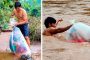 بالفيديو...طلاب في فيتنام يعبرون النهر بأكياس بلاستيكية طلبا للعلم