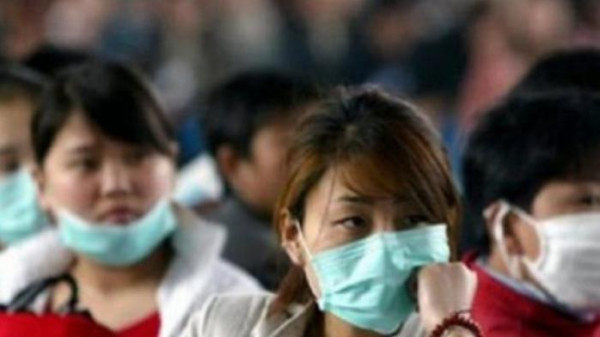 الصين تعلن عن أول وفاة مرتبطة بتفشي مرض غامض