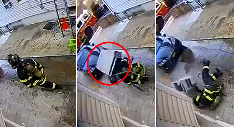 لحظات مروعة بعد سقوط مكيف هواء ثقيل على رجل إطفاء أثناء عمله (فيديو )