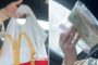 يعثر على 5 آلاف دولار بالخطأ مع وجبة من ماكدونالدز (فيديو)